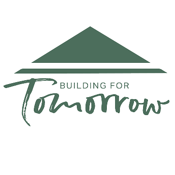 Green geometric roof shape above the words 